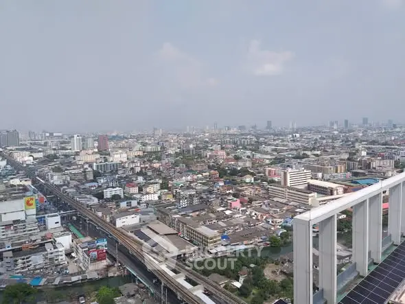 Stunning cityscape view from a high-rise balcony showcasing urban living at its finest.