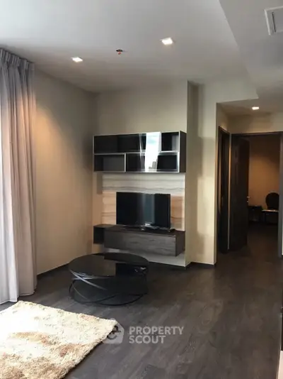 Modern living room with sleek TV setup and stylish decor