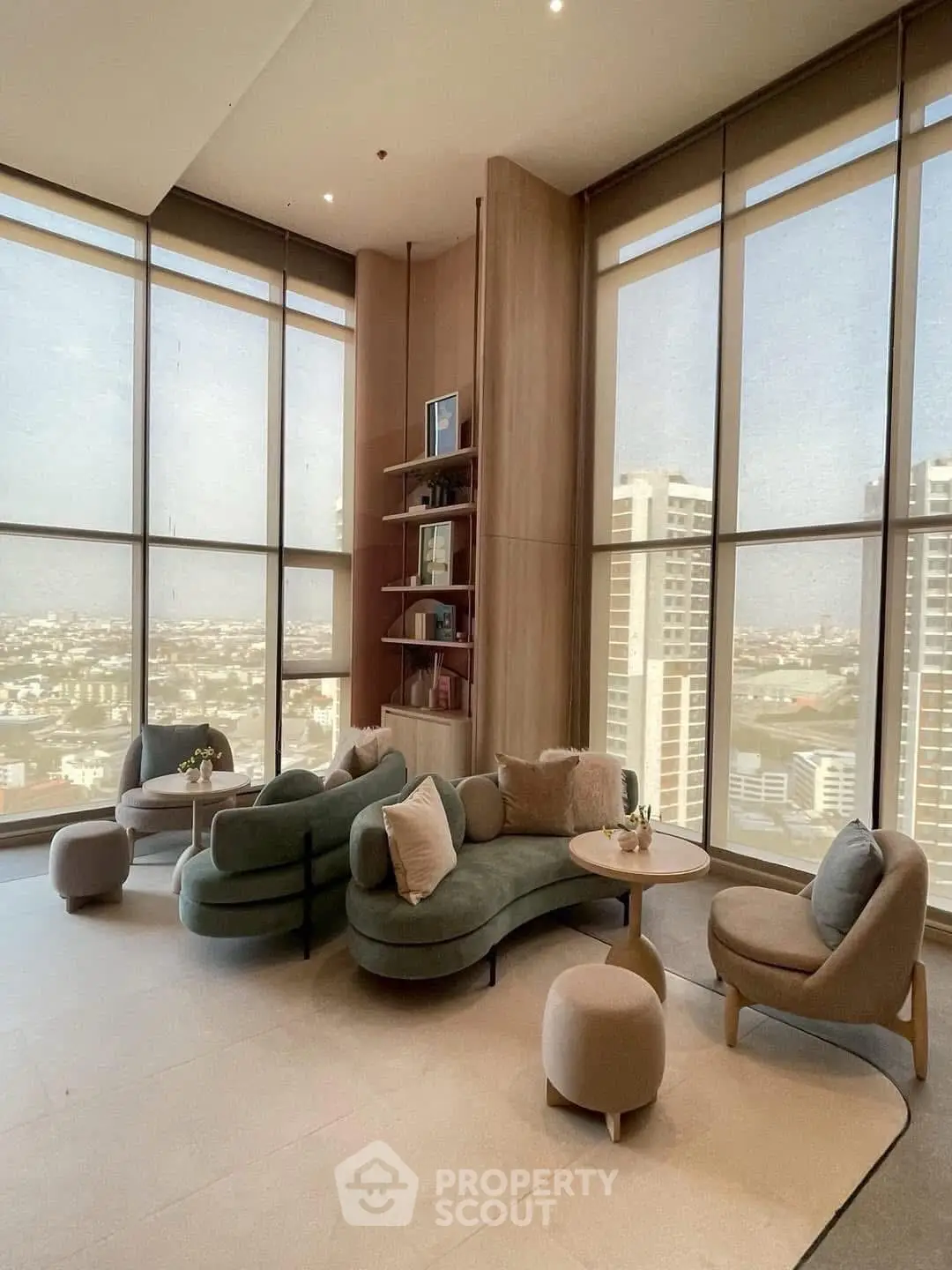 Luxurious living room with panoramic city views and elegant modern furniture.