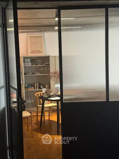 Chic study room with modern furniture and stylish decor, perfect for productivity and relaxation.