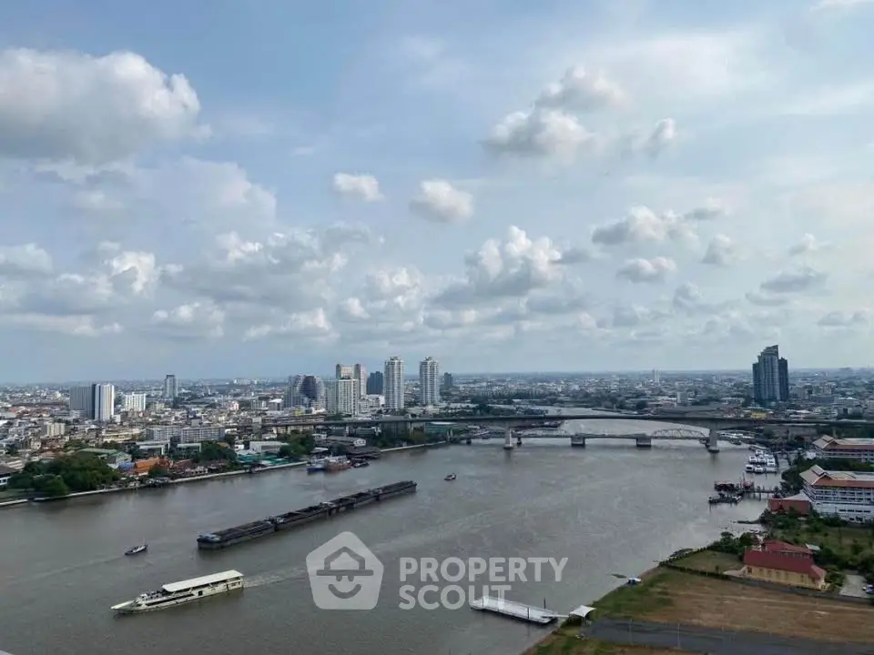Stunning river view with city skyline, perfect for high-rise living enthusiasts.