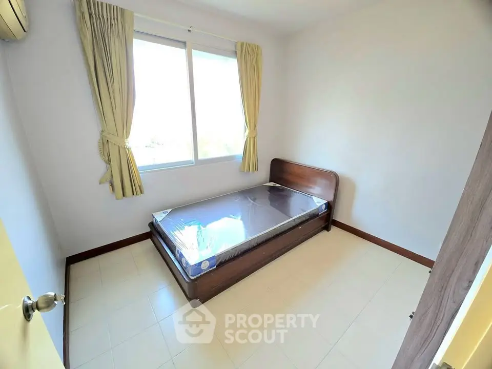 Cozy bedroom with natural light and minimalist design