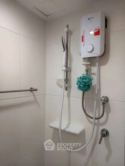 Modern bathroom with sleek shower and water heater installation