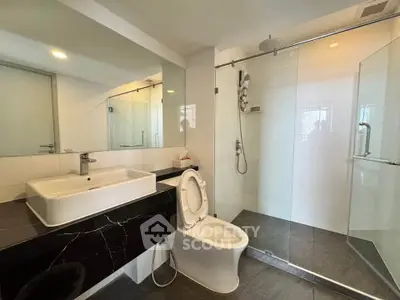 Modern bathroom with sleek design and spacious shower area