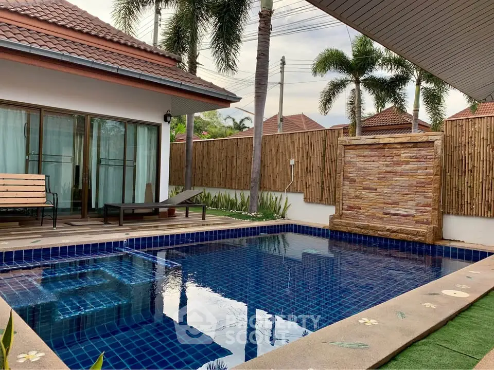 Luxurious villa with private pool and tropical garden, perfect for relaxation and entertaining.