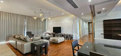 Luxurious modern living room with elegant lighting and spacious layout, perfect for relaxation and entertainment.