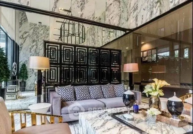 Luxurious modern living room with marble accents and elegant decor