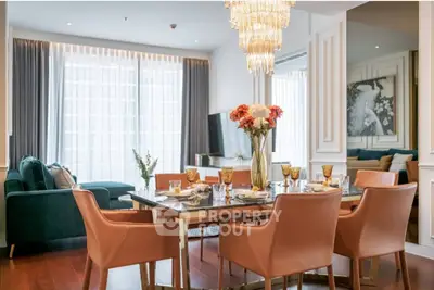 Luxurious dining and living area with elegant decor and modern furnishings