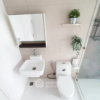 Modern bathroom with sleek fixtures and stylish decor