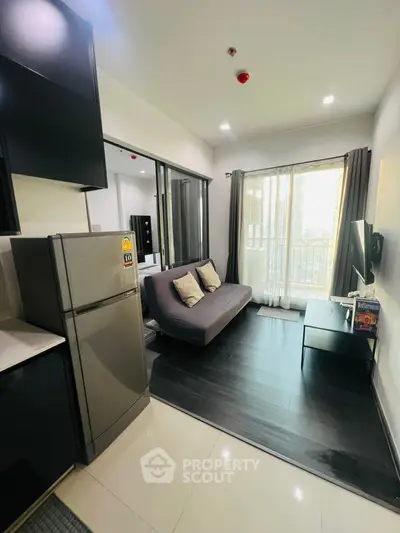 Modern living room with sleek design and balcony view