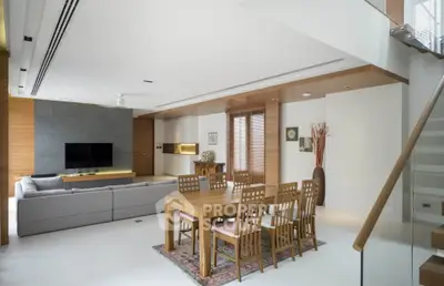 Spacious modern living room with elegant dining area and stylish decor