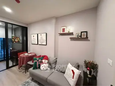 Cozy living room with festive decor and balcony view