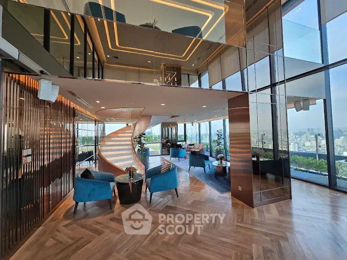 Luxurious modern living room with stunning city view and elegant spiral staircase