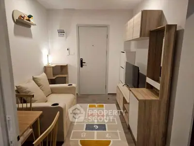 Cozy living room with modern furniture and playful hopscotch rug