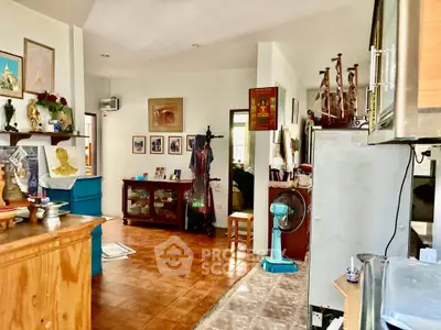 Charming eclectic living space with wooden floors and unique decor elements.