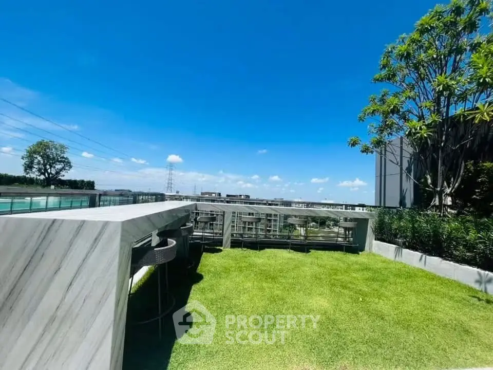 Stunning rooftop garden with panoramic city views and modern design elements.