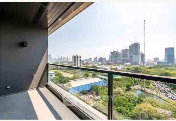 Stunning cityscape view from modern balcony in high-rise apartment