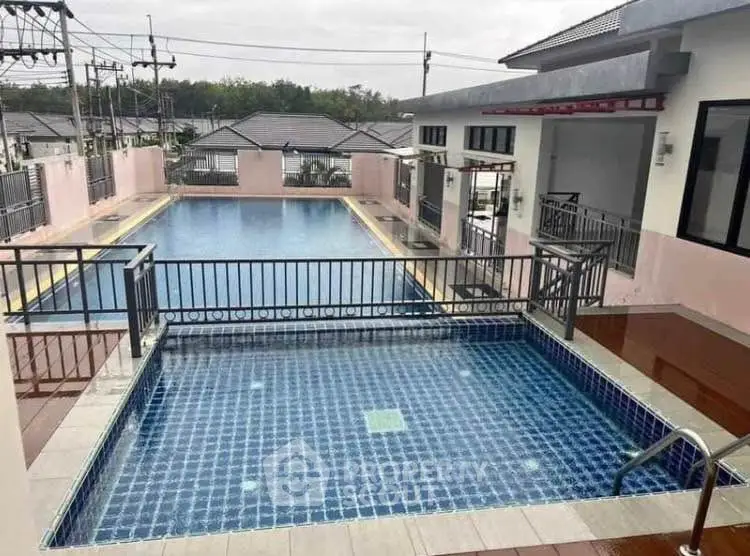 Stunning residential pool area with modern design and spacious layout.
