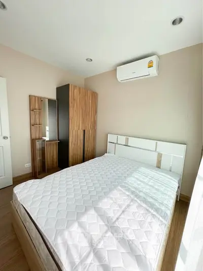 Bright and cozy bedroom with modern furnishings and natural light