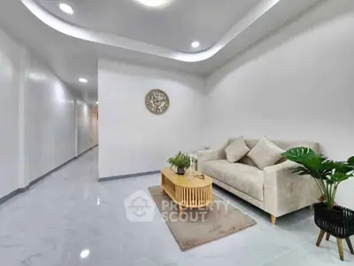 Modern minimalist living room with sleek sofa and stylish decor