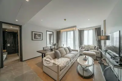 Luxurious modern living room with elegant decor and ample natural light