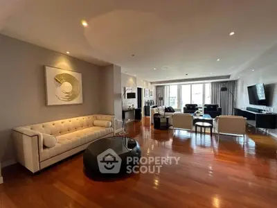 Spacious modern living room with elegant decor and hardwood floors