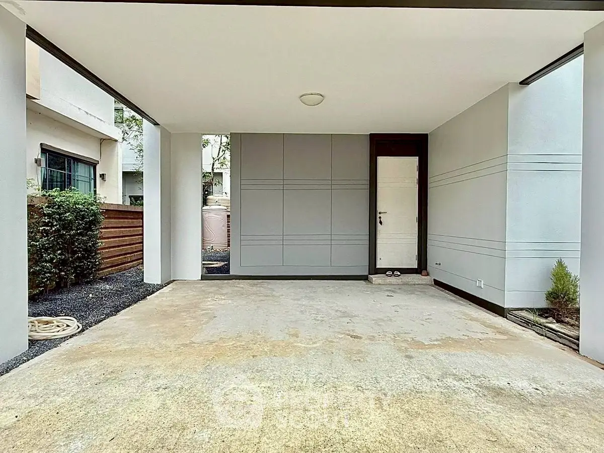 Spacious modern carport with sleek design and ample space for parking.