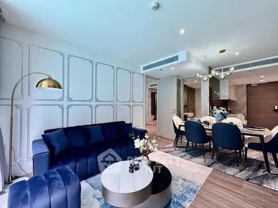 Luxurious modern living room with elegant decor and dining area