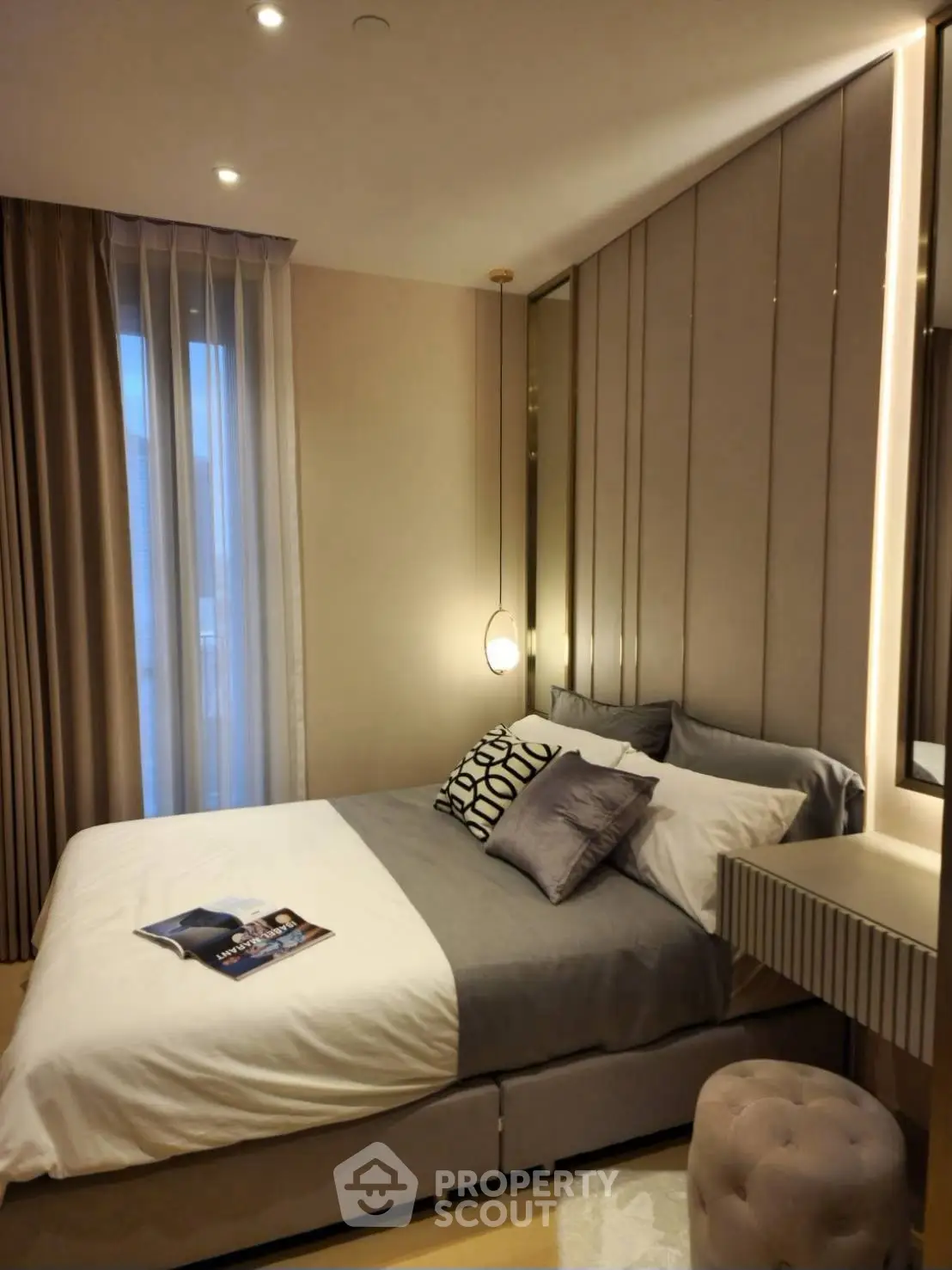 Luxurious modern bedroom with elegant decor and ambient lighting