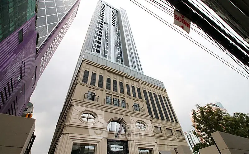 Stunning high-rise building with modern architectural design in urban setting.