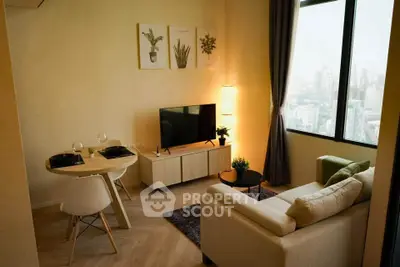 Modern living room with city view, stylish furniture, and elegant decor.