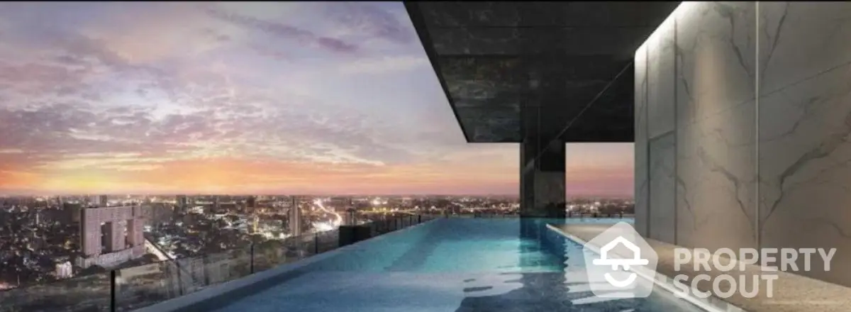 Luxurious rooftop infinity pool with stunning city skyline view at sunset