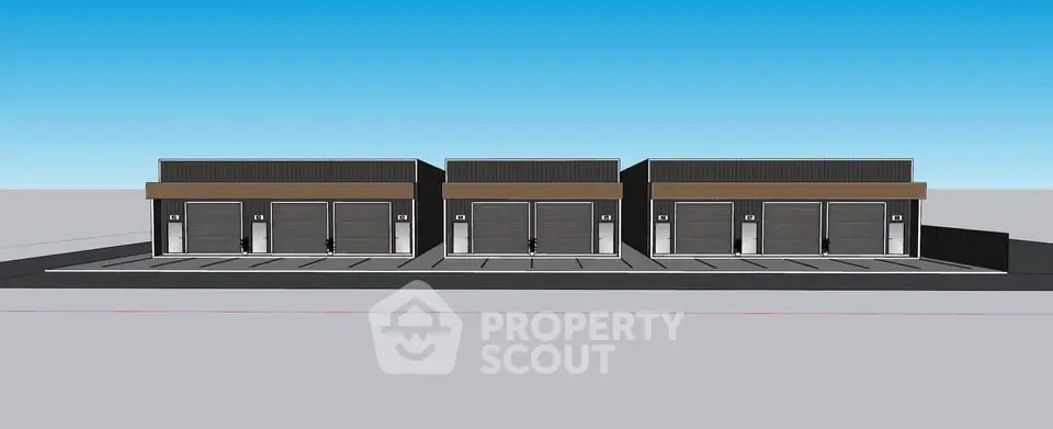 Modern industrial warehouse complex with multiple units and parking spaces.