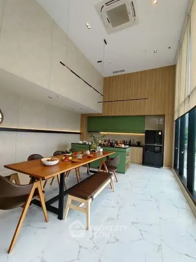 Modern kitchen with open layout and stylish dining area