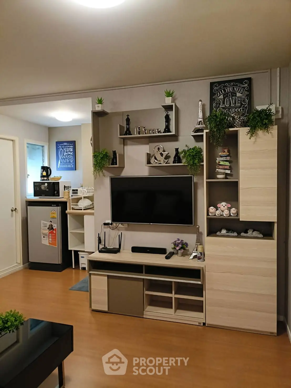Modern living room with stylish entertainment center and cozy decor