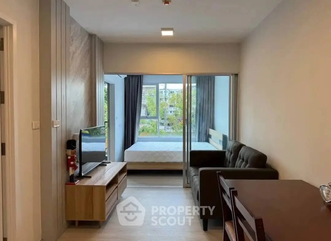 Modern studio apartment with open layout and stylish furnishings