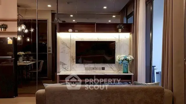 Luxurious living room with modern decor and elegant lighting