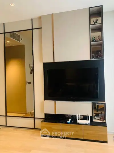 Modern living room with sleek TV unit and stylish decor