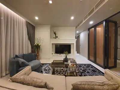 Luxurious living room with elegant decor, plush seating, and modern entertainment center, perfect for relaxation.