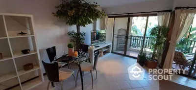 Spacious living room with balcony view and modern decor