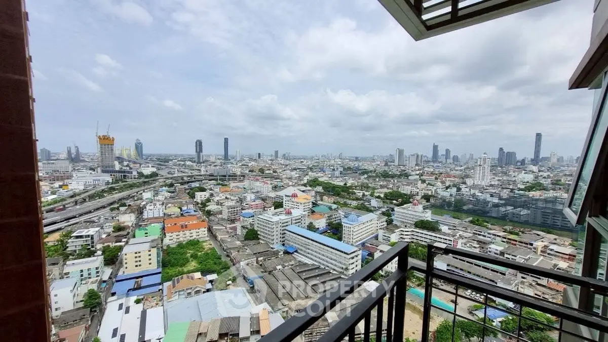 Stunning cityscape view from high-rise balcony with expansive skyline and urban landscape.