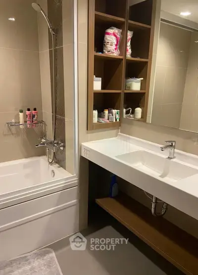Modern bathroom with sleek fixtures and ample storage space