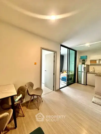 Modern open-layout apartment with stylish furniture and bright lighting