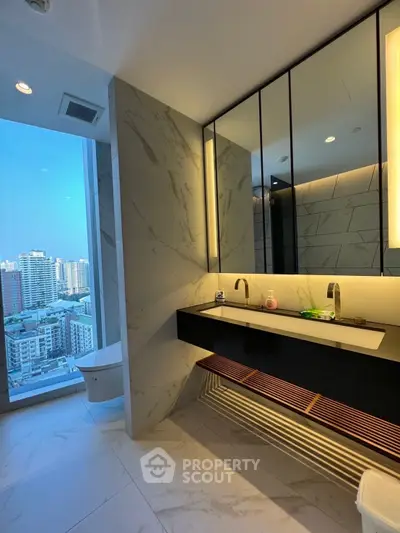 Luxurious bathroom with city view and modern fixtures