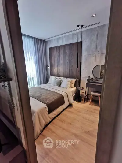 Elegant bedroom with modern decor and natural light