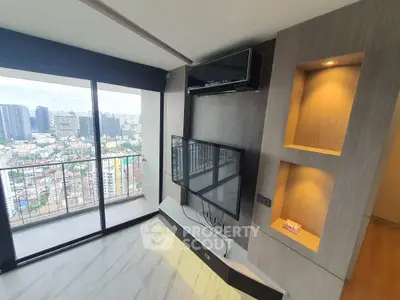 Modern living room with city view and stylish TV setup