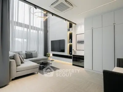 Luxurious modern living room with high ceilings and elegant decor