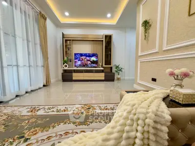 Luxurious living room with elegant decor and modern entertainment center