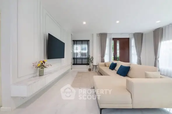 Spacious modern living room with elegant decor and large sofa