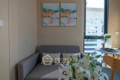 Cozy living room with modern decor and city view